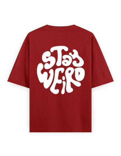 Oversized red streetwear t-shirt with bold white 'Stay Weird' graphic on back