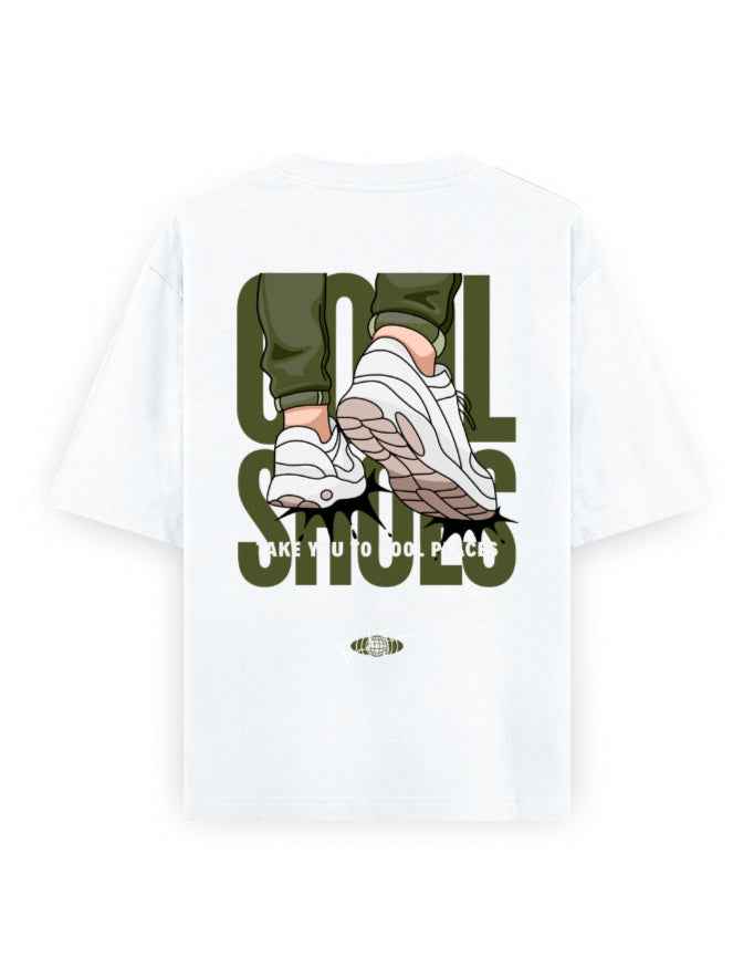 White oversized t-shirt with graphic of sneakers and legs, bold text 'Cool Shoes' on back