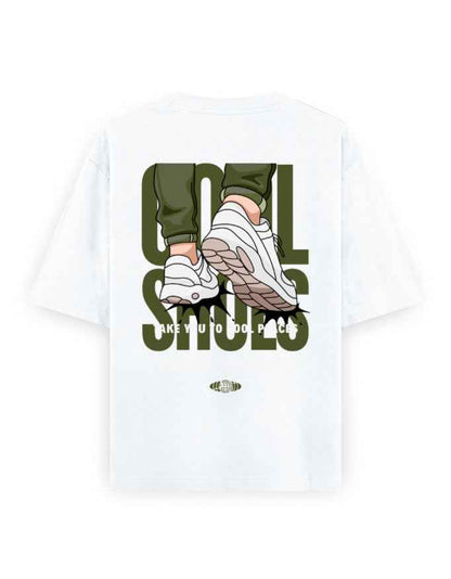 White oversized t-shirt with graphic of sneakers and legs, bold text 'Cool Shoes' on back