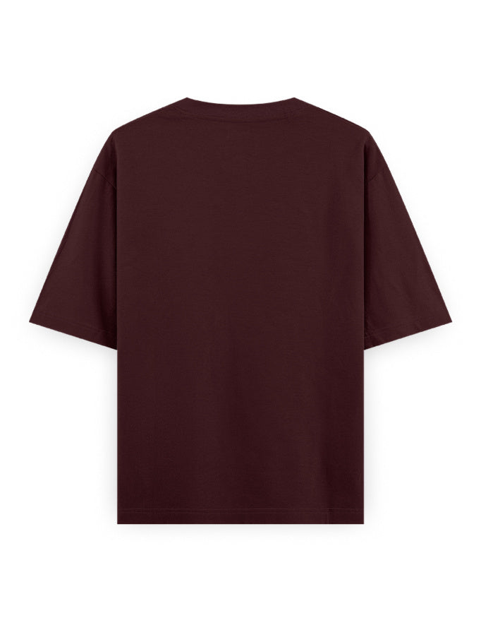 Back view of plain oversized maroon t-shirt on white background, streetwear fashion