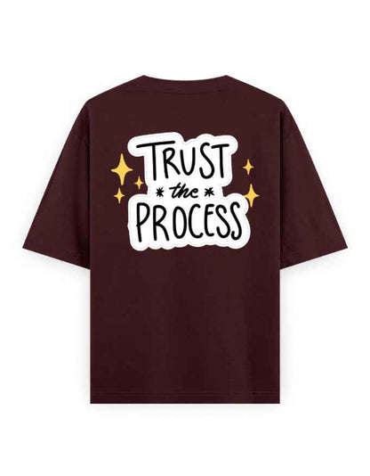 Oversized maroon streetwear t-shirt with 'Trust the Process' graphic on back