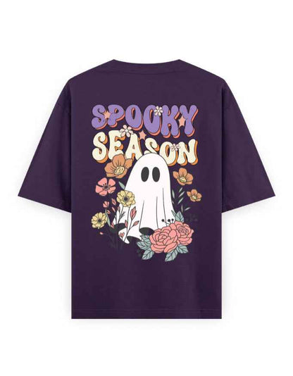 Purple oversized t-shirt with 'Spooky Season' text, ghost and floral graphic on the back.