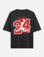 A TREND FEVER black short-sleeve t-shirt shown from the back, featuring a large red and white graphic print of the number 24, a basketball player silhouette, and the words 'SLAM DUNK' and 'KING, DADDIE OF THE DAY'.
