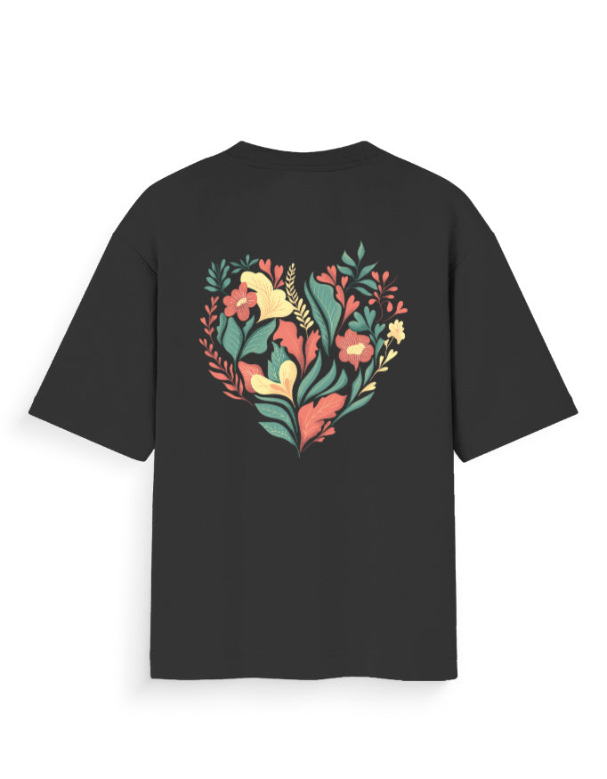 Black oversized t-shirt with colorful heart-shaped floral graphic on the back
