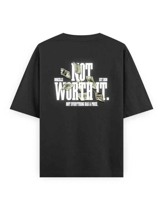 Black oversized t-shirt with 'Not Worth It' slogan, dollar bill graphics, streetwear style.