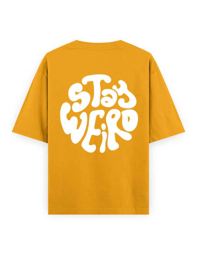 Yellow oversized t-shirt with bold white 'Stay Weird' graphic on back, streetwear fashion