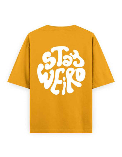 Yellow oversized t-shirt with bold white 'Stay Weird' graphic on back, streetwear fashion