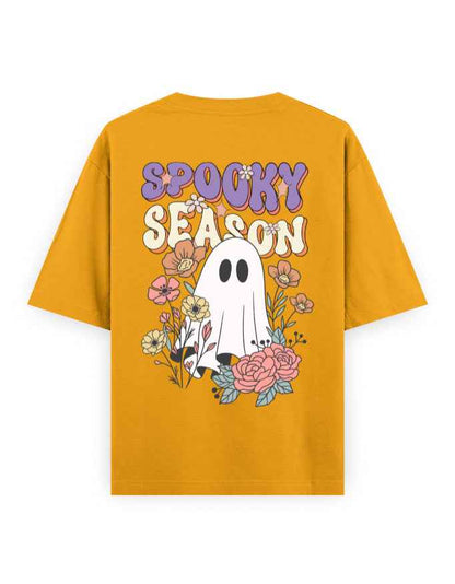 Mustard yellow oversized t-shirt with 'Spooky Season' text, ghost graphic, and floral design on back