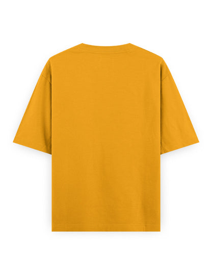 Back view of an oversized mustard yellow streetwear t-shirt on white background