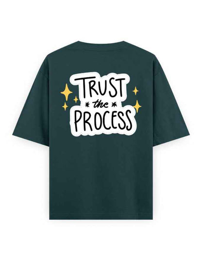 Oversized dark green streetwear t-shirt with 'Trust the Process' bold graphic on back