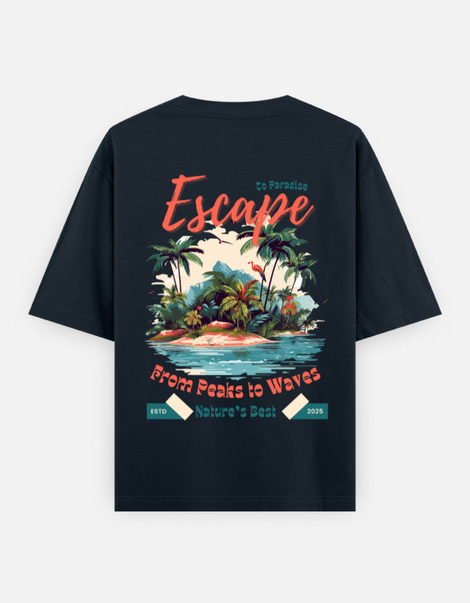 A black short-sleeve t-shirt shown from the back, featuring a colorful graphic print of a tropical island with palm trees, waves, and retro-style text reading 'Escape', 'From Peaks to Waves', and 'Nature's Best'.