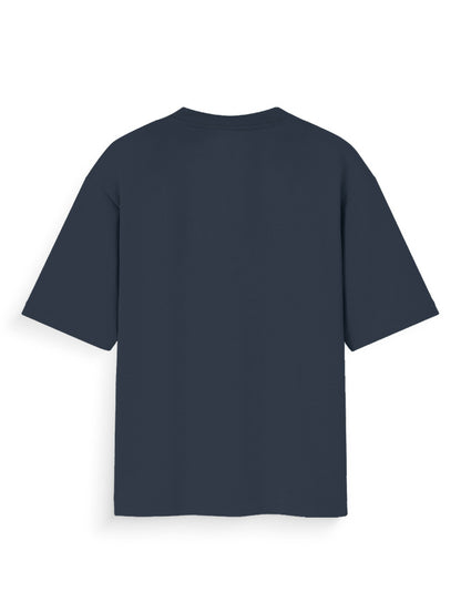 Back view of dark blue oversized streetwear t-shirt with short sleeves on white background.