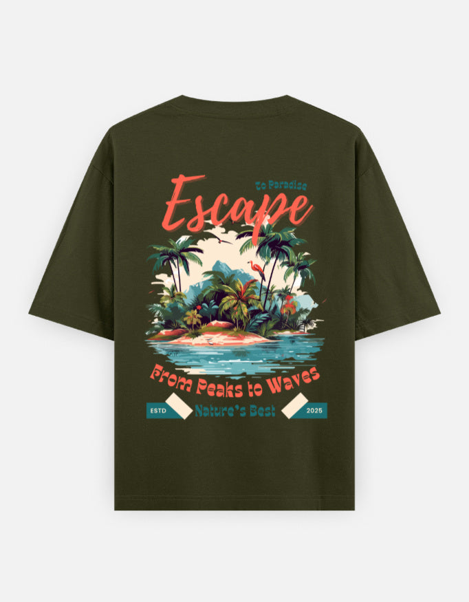 An olive green short-sleeve t-shirt with a colorful tropical beach graphic on the back. The graphic features the word 'Escape' in coral script, a tropical island with palm trees, a blue ocean, and text reading 'From Peaks to Waves' and 'Nature's Best'.