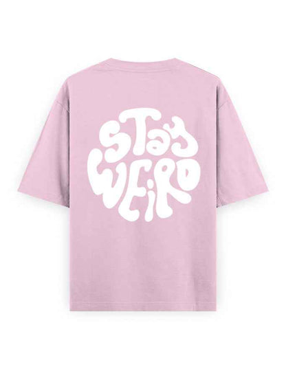 Oversized light purple t-shirt with bold white 'Stay Weird' text on the back