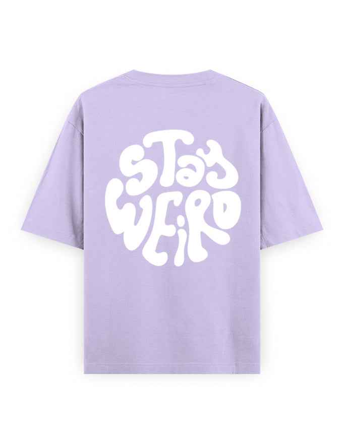 Lavender oversized t-shirt with bold white Stay Weird graphic on back, streetwear style