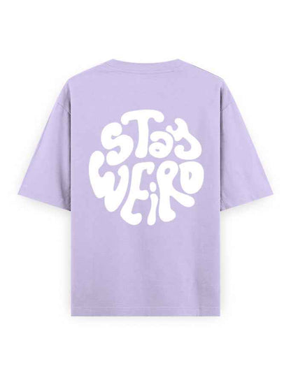 Lavender oversized t-shirt with bold white Stay Weird graphic on back, streetwear style