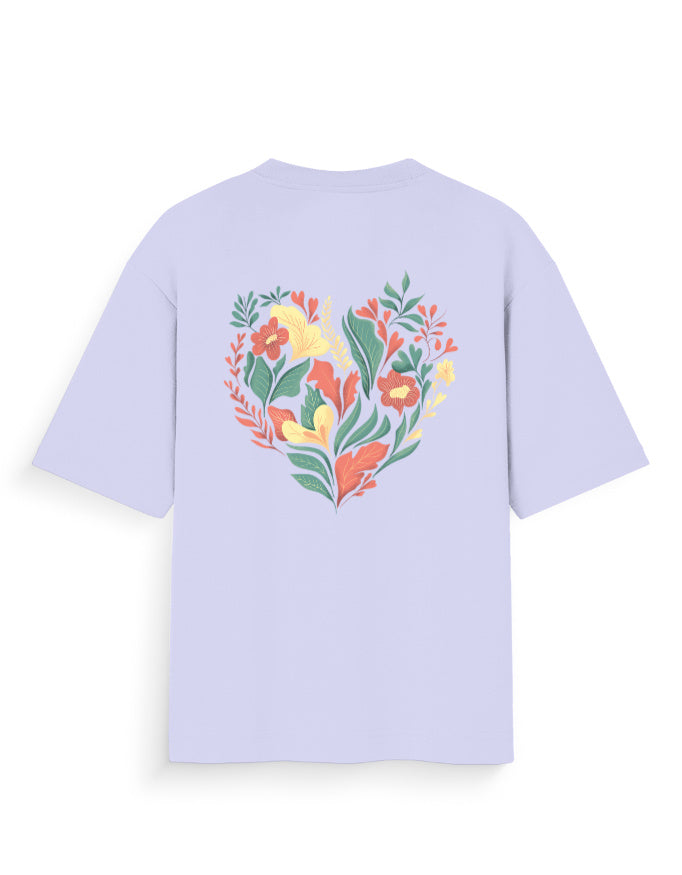 Lavender oversized t-shirt with heart-shaped floral graphic on back, streetwear style