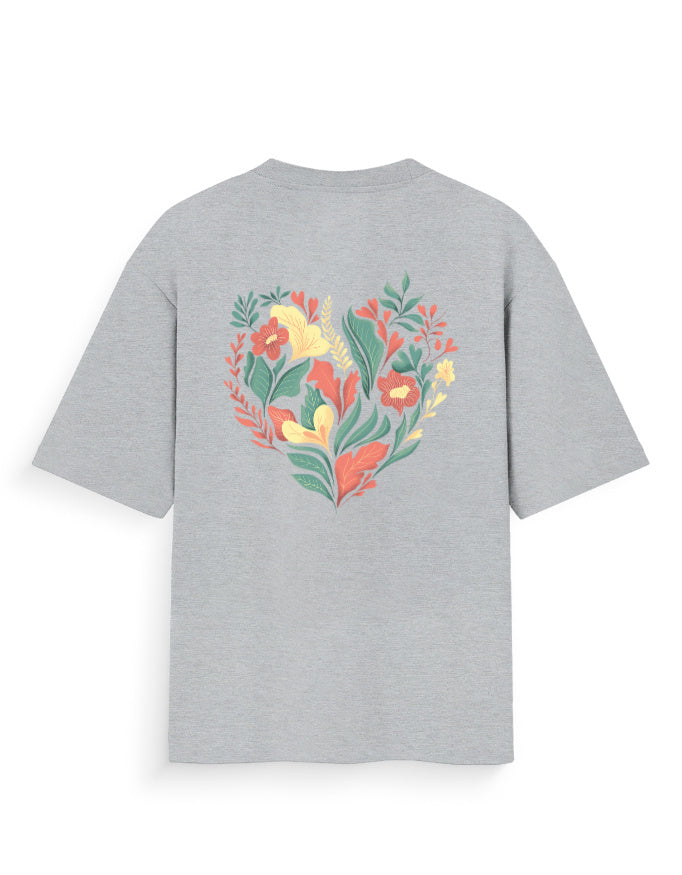 Grey oversized t-shirt with colorful heart-shaped floral graphic on back