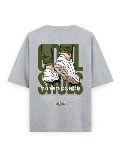 Grey oversized streetwear t-shirt with graphic print of sneakers and bold text on the back