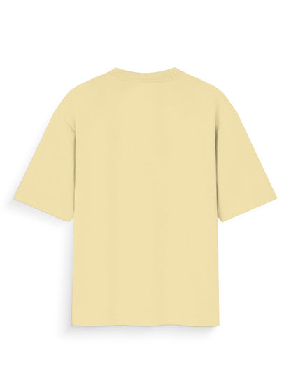 Back view of an oversized beige streetwear t-shirt on white background