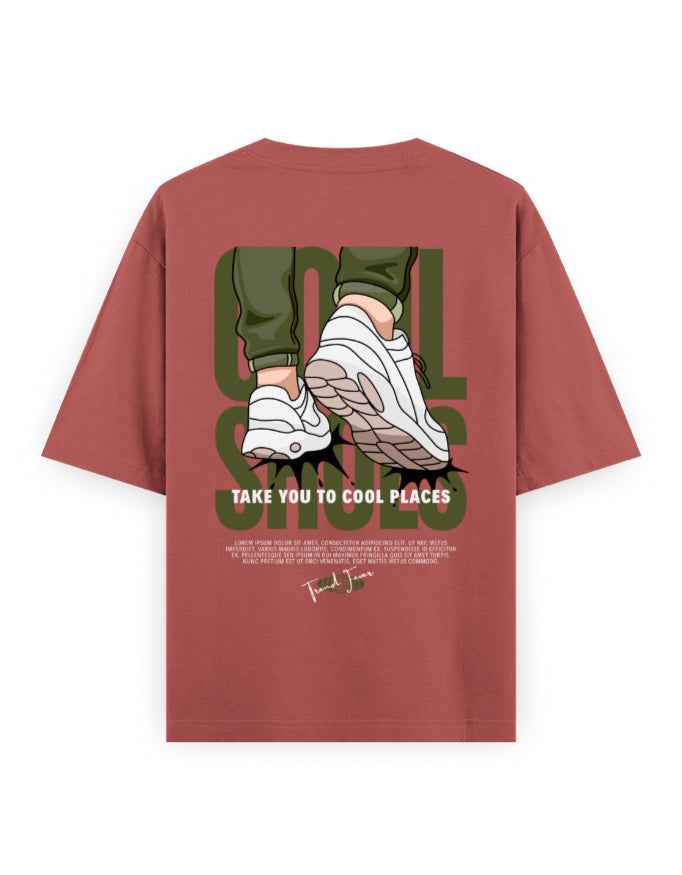 Oversized streetwear t-shirt with cartoon sneakers and 'Take You to Cool Places' graphic print
