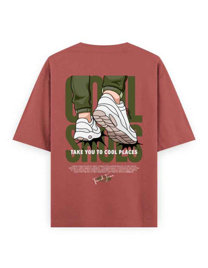 Oversized streetwear t-shirt with cartoon sneakers and 'Take You to Cool Places' graphic print