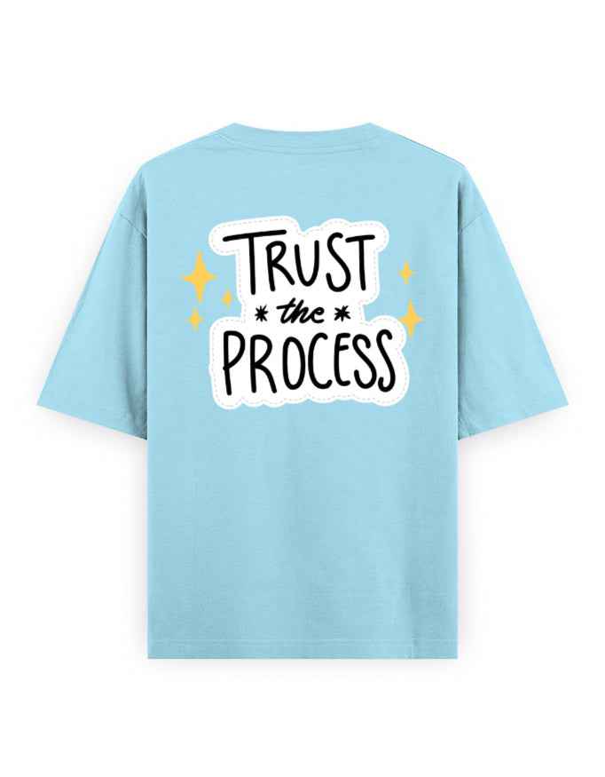 Light blue oversized streetwear t-shirt with 'Trust the Process' graphic on back