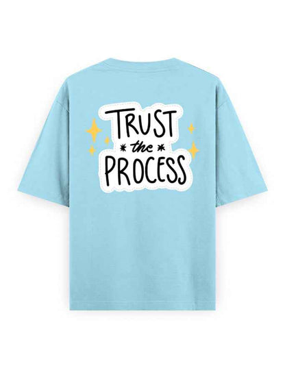 Light blue oversized streetwear t-shirt with 'Trust the Process' graphic on back