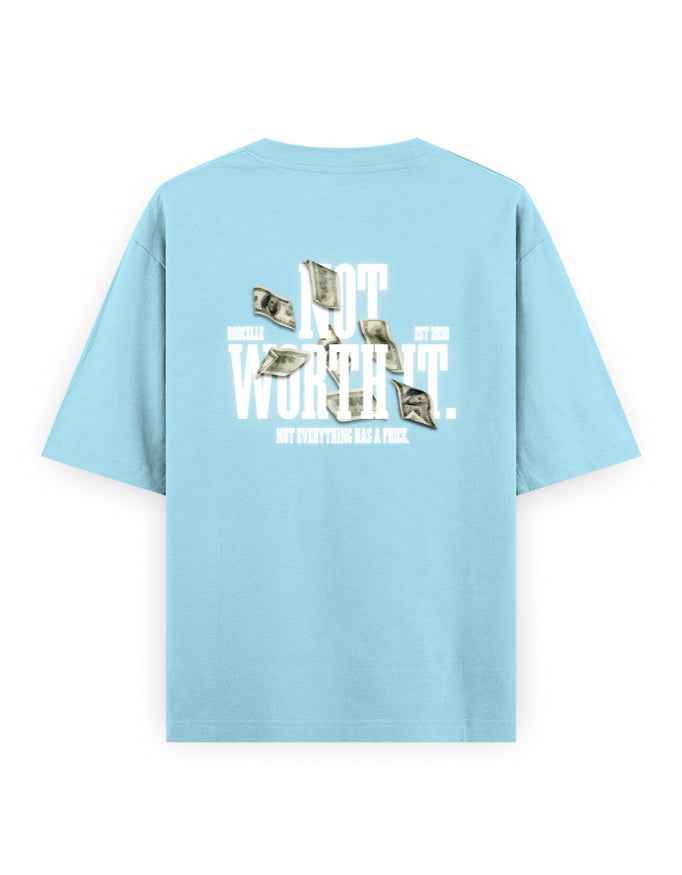 Light blue oversized t-shirt with 'Not Worth It' text, dollar bill graphic, streetwear fashion.