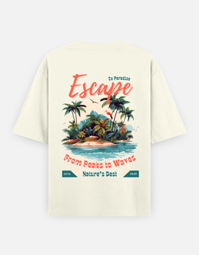 An off-white short-sleeve t-shirt with a large, colorful graphic print on the back. The graphic features a tropical island illustration with palm trees, blue water, and coral text reading 'Escape', 'To Paradise', 'From Peaks to Waves', and 'Nature's Best'. By Trend Fever