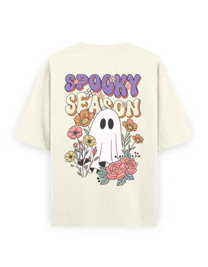 Oversized t-shirt with cartoon ghost, floral design, and 'Spooky Season' text on back.