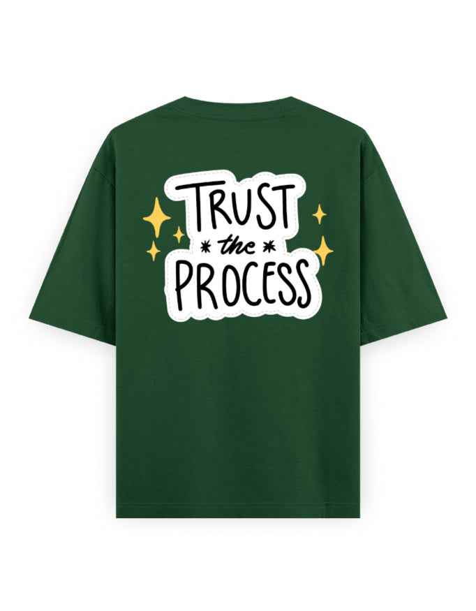 Green oversized streetwear t-shirt with 'Trust the Process' graphic on the back