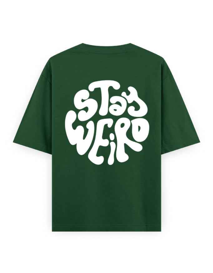 Oversized green t-shirt with bold white 'Stay Weird' graphic on the back, streetwear fashion