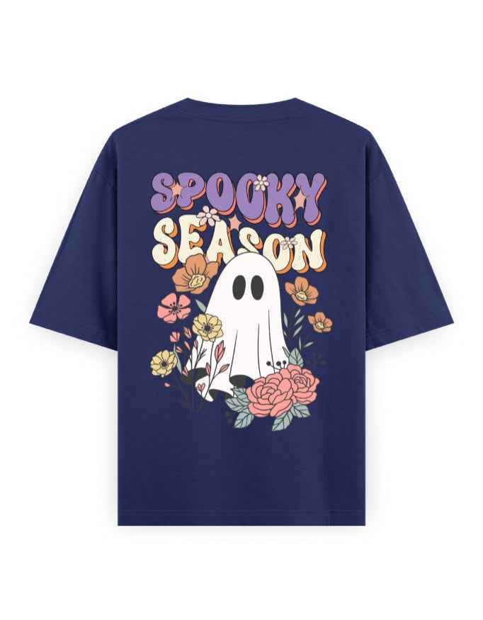 Navy blue oversized t-shirt with 'Spooky Season' text, cartoon ghost and floral graphic on back