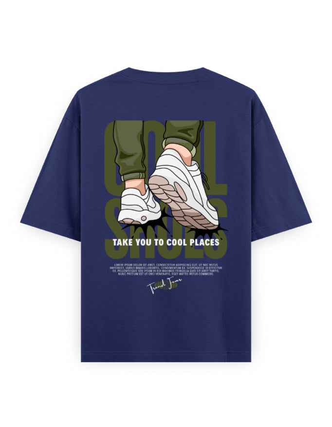 Navy blue oversized t-shirt with cartoon sneakers, slogan 'Take you to cool places,' streetwear fashion