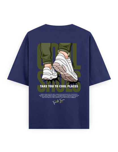 Navy blue oversized t-shirt with cartoon sneakers, slogan 'Take you to cool places,' streetwear fashion