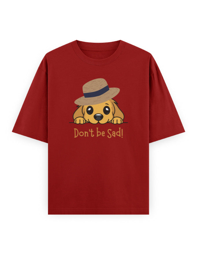 Red oversized t-shirt with cute dog graphic in a hat and 'Don't be Sad!' text, streetwear style
