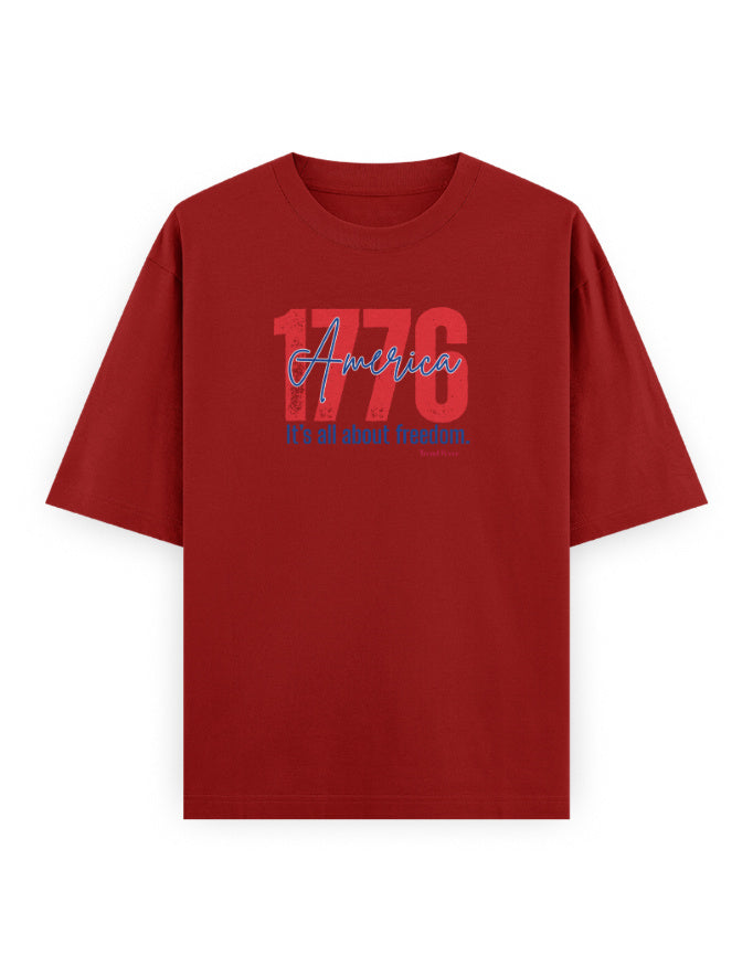 Red oversized t-shirt with '1776 America It's all about freedom' graphic on front.
