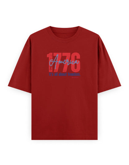 Red oversized t-shirt with '1776 America It's all about freedom' graphic on front.