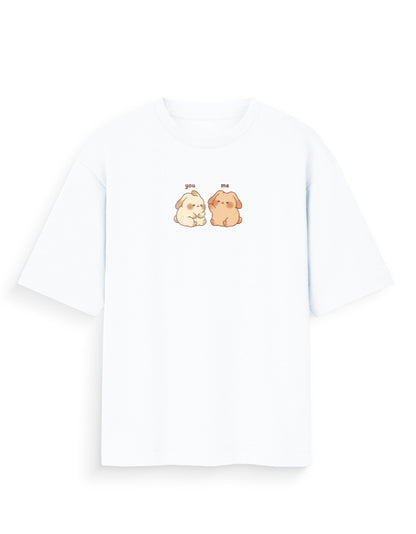 White oversized t-shirt with cute cartoon puppies and 'you' and 'me' text on the front