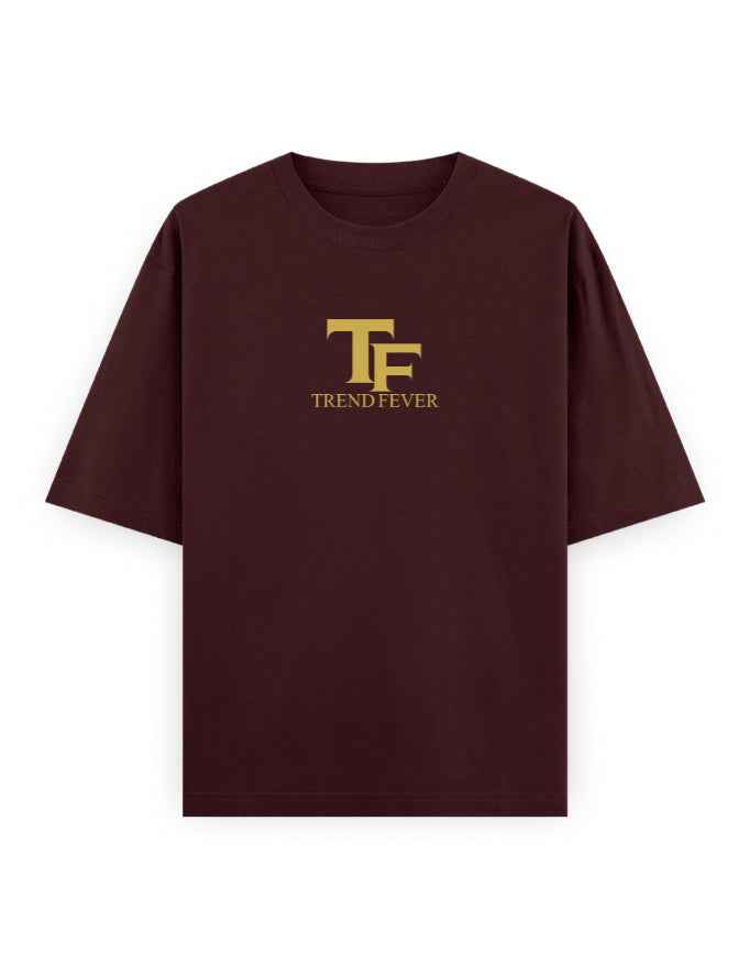 Oversized maroon t-shirt with gold TF Trend Fever logo on chest