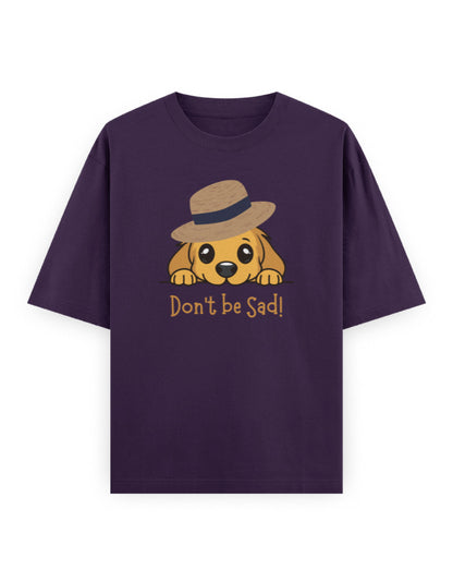 Purple oversized t-shirt with cute dog in hat and 'Don't be Sad!' cartoon graphic