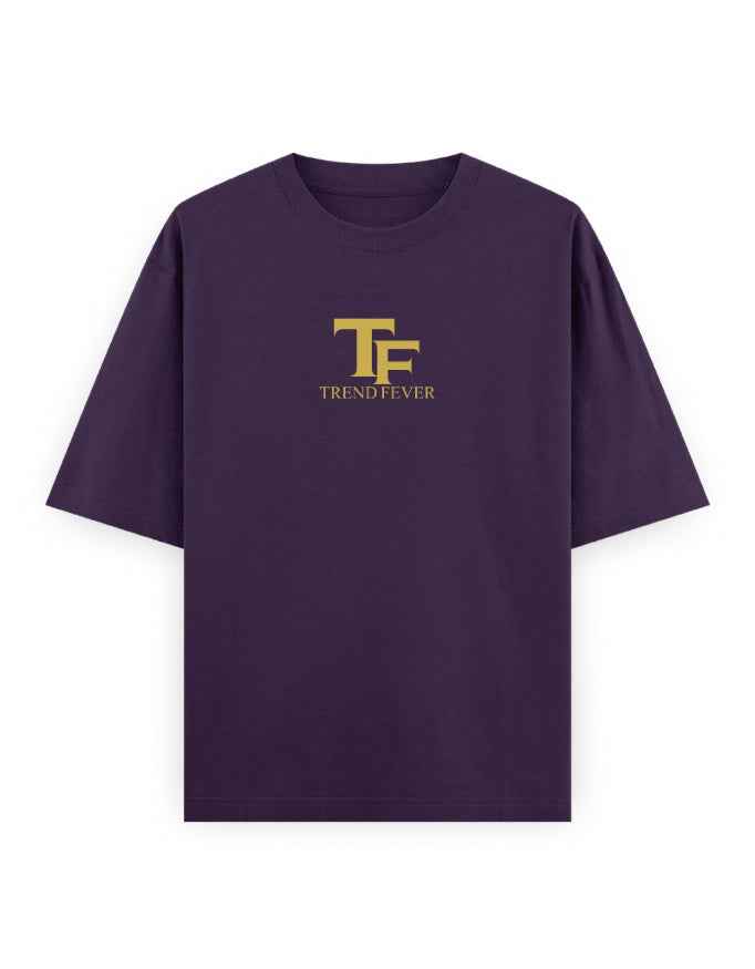 Oversized purple t-shirt with gold TF Trend Fever logo, streetwear style, front view