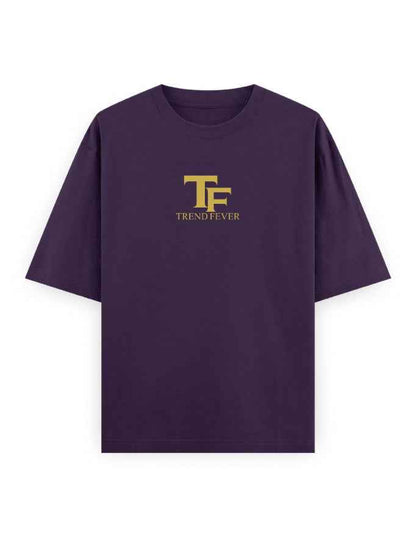 Oversized purple t-shirt with gold TF Trend Fever logo, streetwear style, front view