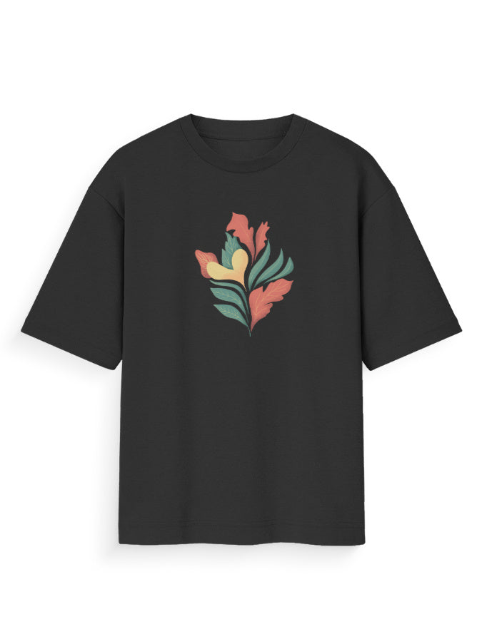 Black oversized t-shirt with colorful abstract leaf graphic on front, streetwear fashion