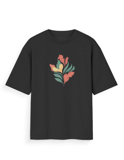 Black oversized t-shirt with colorful abstract leaf graphic on front, streetwear fashion