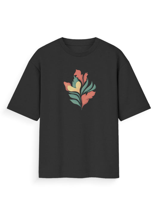 Black oversized t-shirt with colorful abstract leaf graphic on front, streetwear fashion
