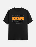 A TREND FEVER black short-sleeve t-shirt with a graphic print on the chest reading 'ESCAPE ESCAPE ESCAPE' in orange and white, with 'FROM REALITY' printed below it, displayed against a light gray background.