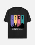 TREND FEVER  black short-sleeve T-shirt with a colorful graphic on the chest. The graphic features the word 'LOST' in black letters inside five vertical panels of purple, yellow, orange, pink, and teal, with a black forest silhouette below.