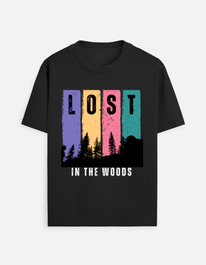 TREND FEVER  black short-sleeve T-shirt with a colorful graphic on the chest. The graphic features the word 'LOST' in black letters inside five vertical panels of purple, yellow, orange, pink, and teal, with a black forest silhouette below.